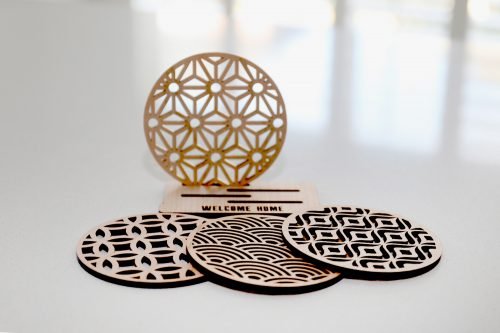 Coasters - Wood coasters Coasters - Wood coasters (Set of four). Materials: Available in Cherry Veneer, Maple Veneer, Walnut Veneer. Size: 3.5 Round. A lovely coaster gift set of wood drinks coasters in 4mm thick Canadian veneered board, Protect your precious table from unwanted spills. Perfect as a housewarming, birthday, Christmas, or welcome present! Custom orders: You can select text on the coaster holder. Set of 4 with base.